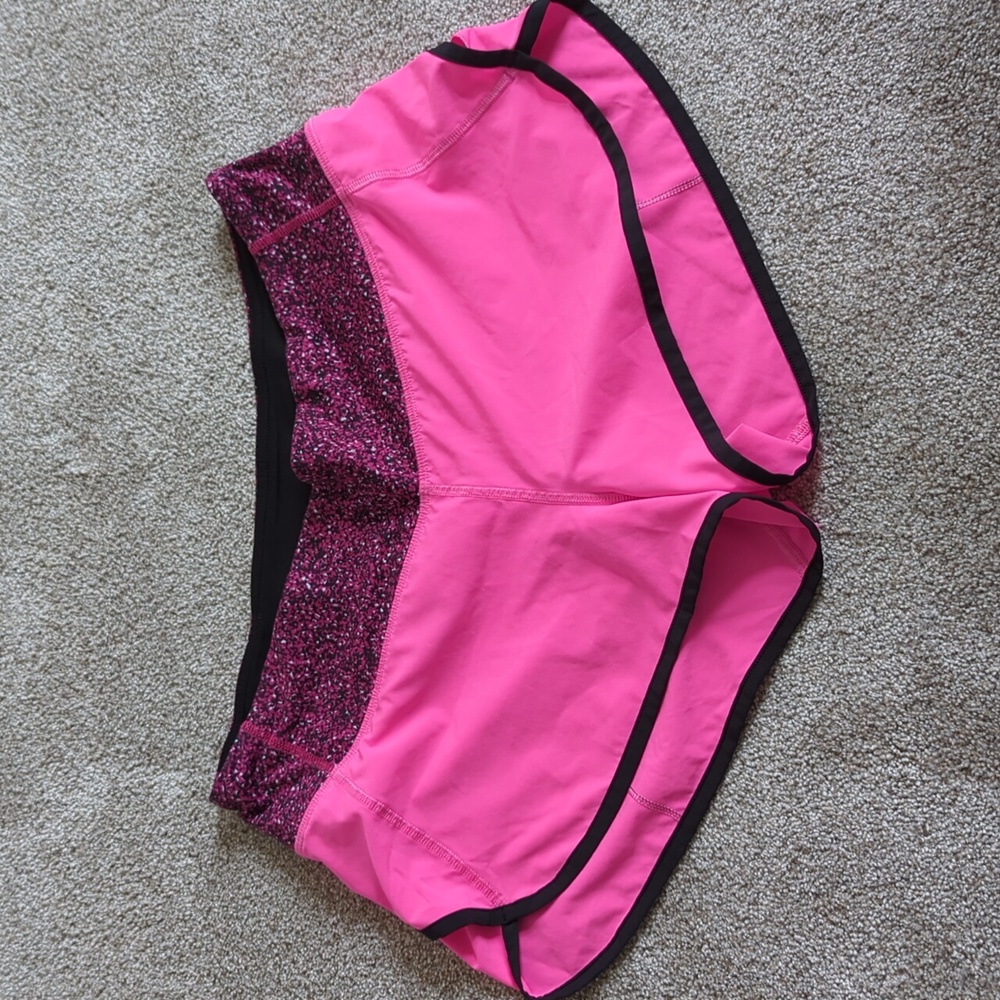 Lululemon size 8 hot pink shorts with black trim